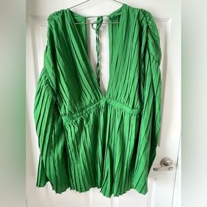 Green ruffled romper